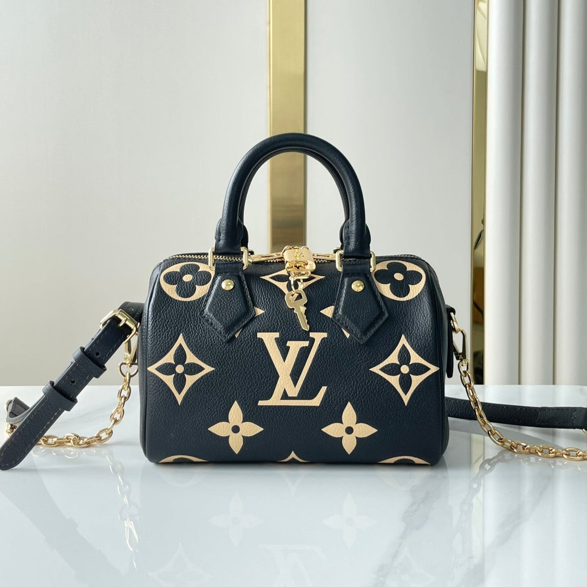 Speedy Bandoulière 20 in Black Cream Monogram Empreinte Leather Gold Hardware