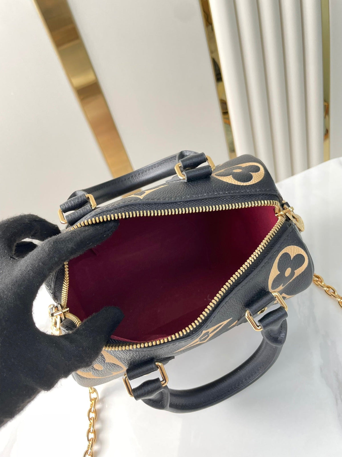 Speedy Bandoulière 20 in Black Cream Monogram Empreinte Leather Gold Hardware