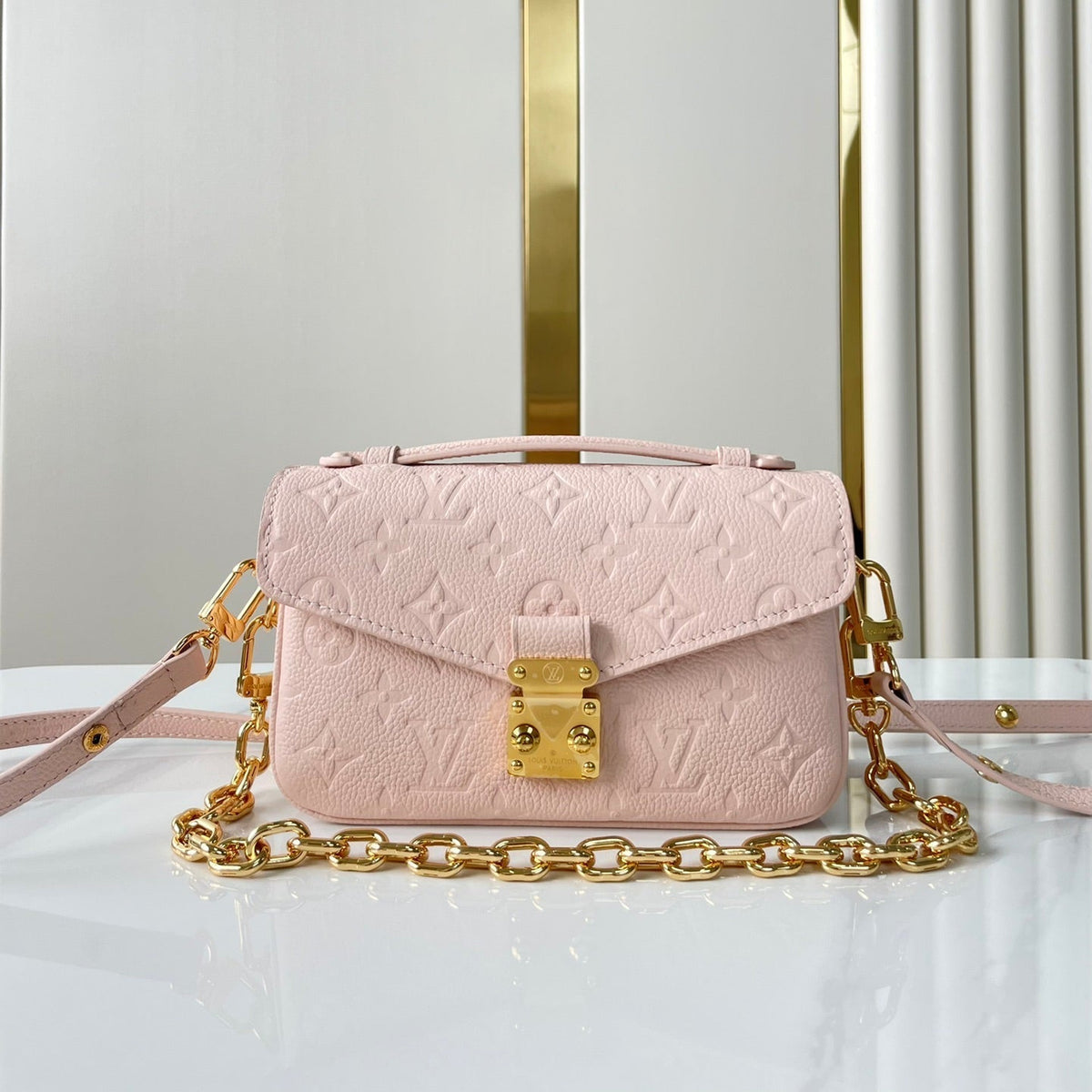 Pochette Métis East West 21 in Pink Opale Monogram Eclipse Canvas Gold Buckle