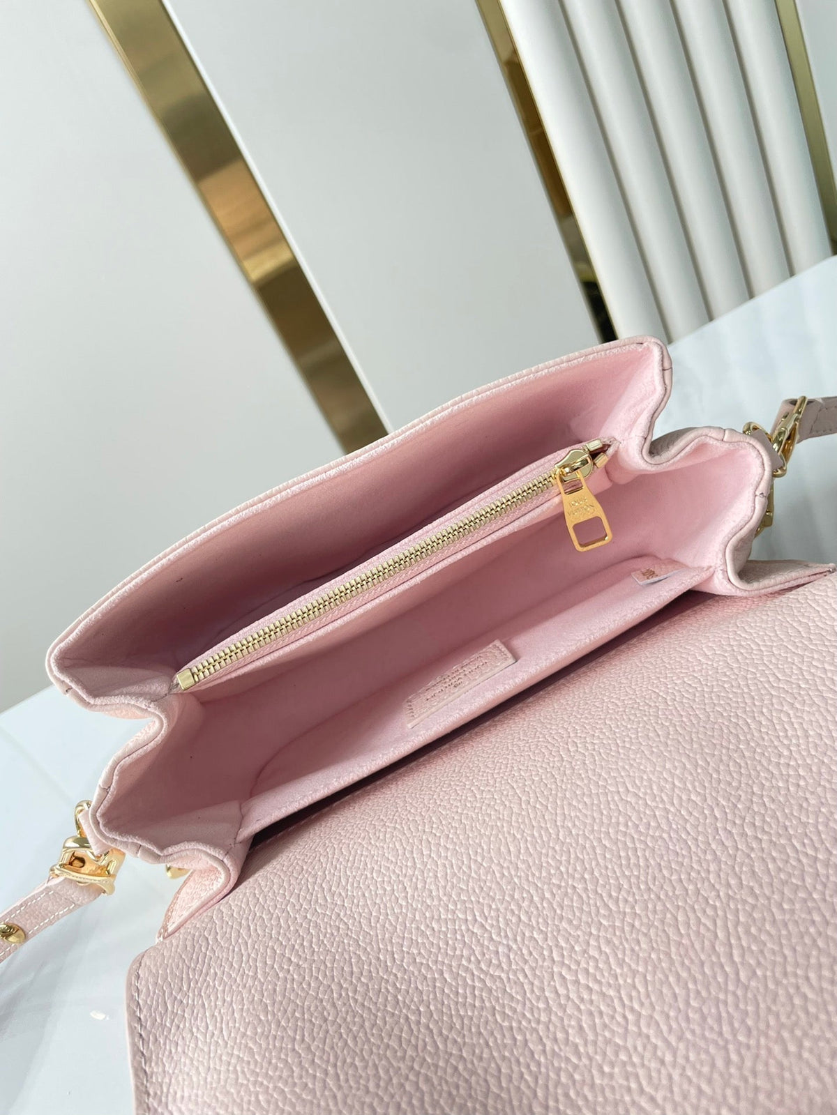 Pochette Métis East West 21 in Pink Opale Monogram Eclipse Canvas Gold Buckle