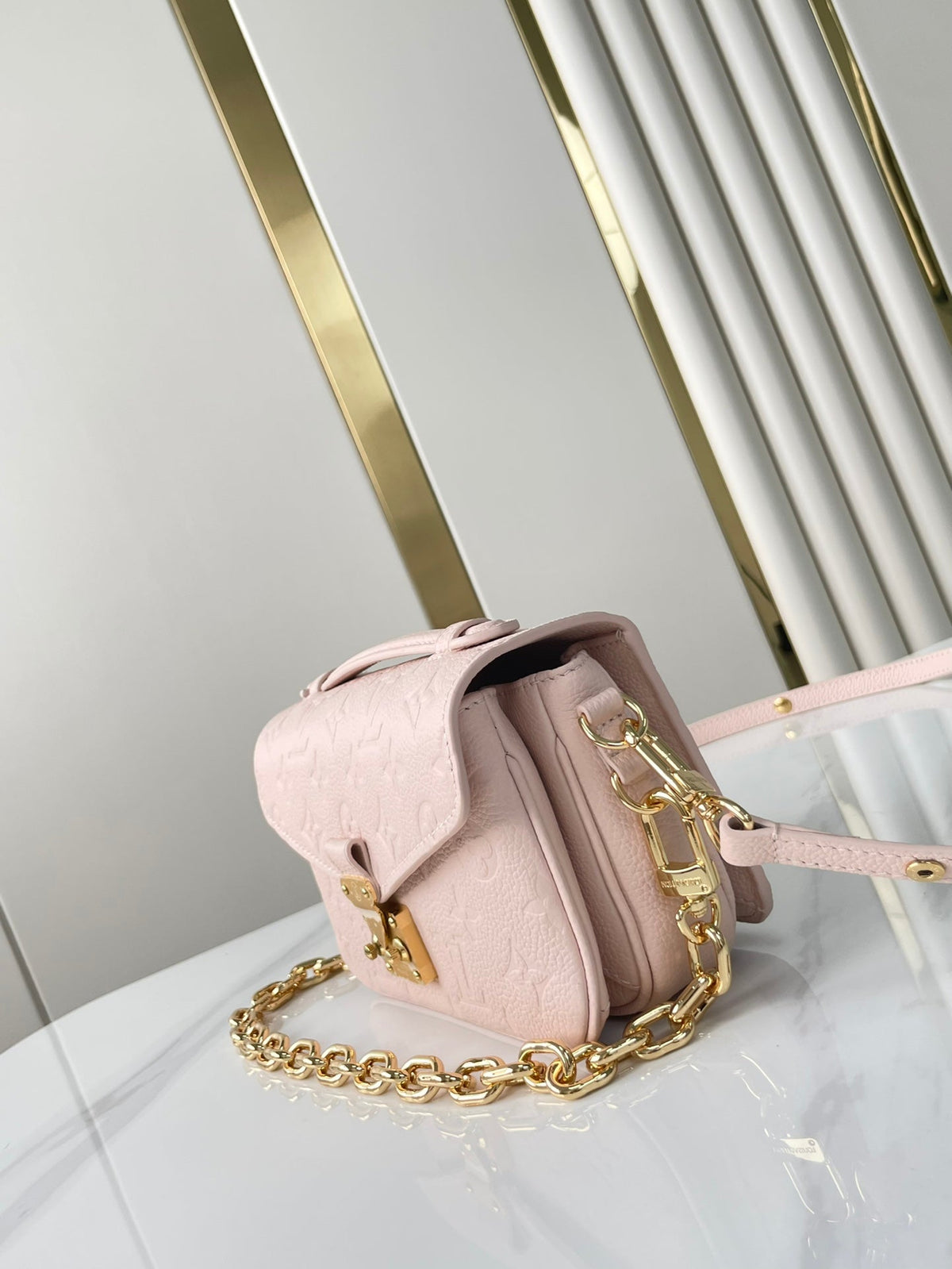 Pochette Métis East West 21 in Pink Opale Monogram Eclipse Canvas Gold Buckle