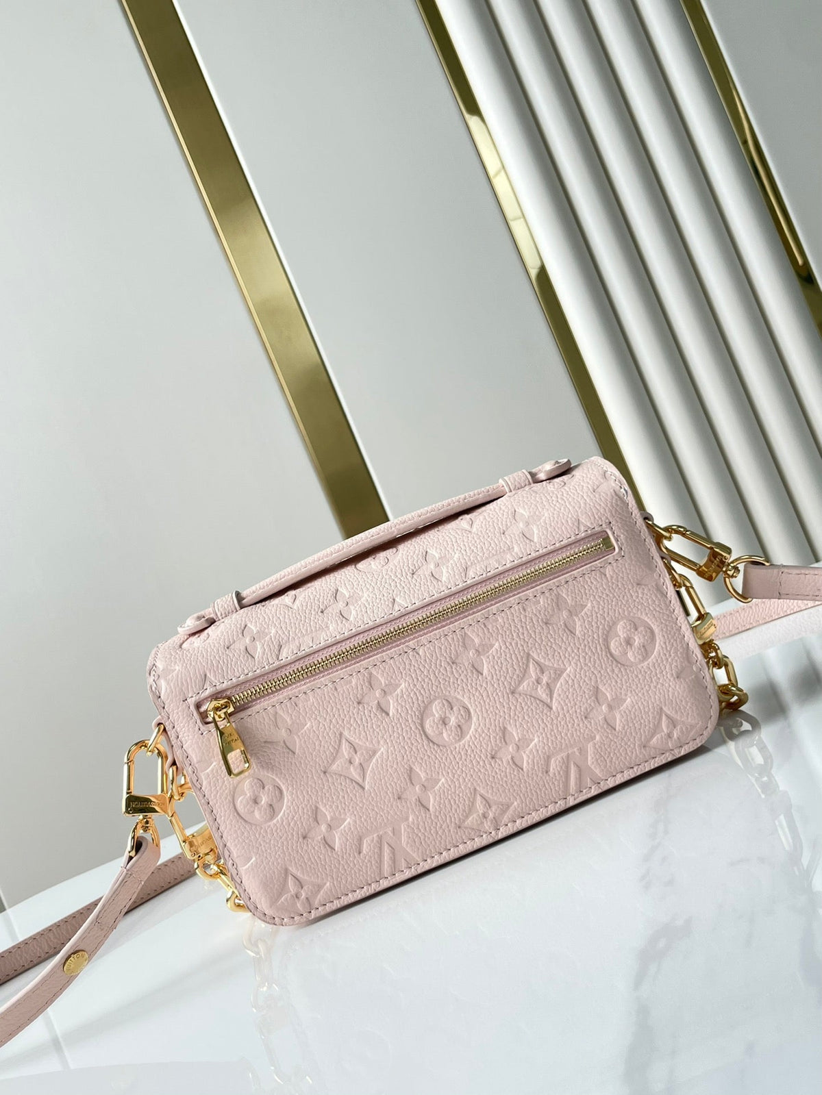 Pochette Métis East West 21 in Pink Opale Monogram Eclipse Canvas Gold Buckle