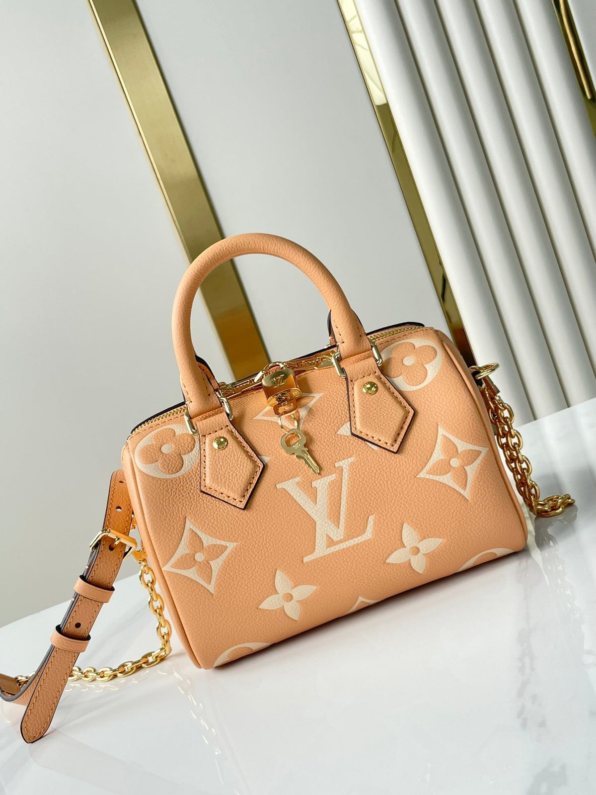 Speedy Bandoulière 20 in Arizona Cream Monogram Empreinte Leather