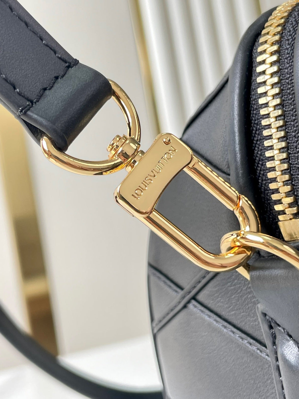 Speedy Bandoulière 25 with Criss Cross Pattern in Black Lambskin