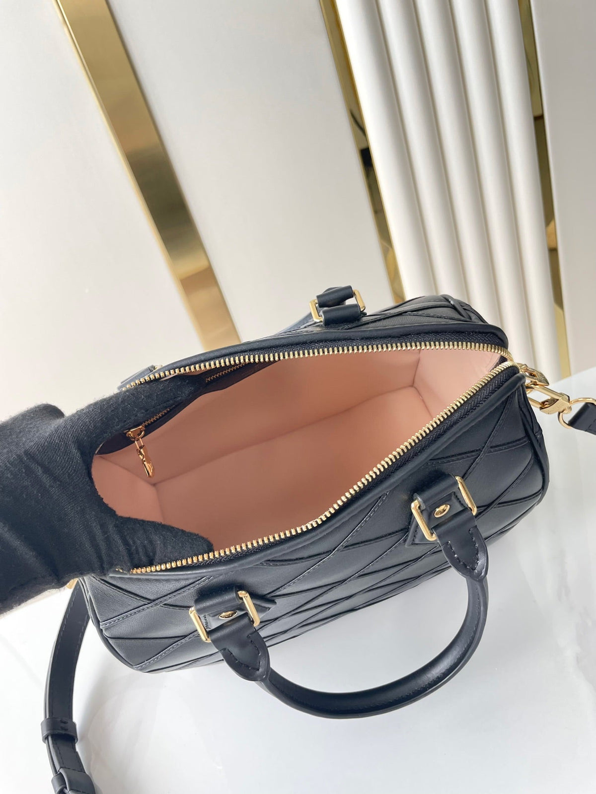 Speedy Bandoulière 25 with Criss Cross Pattern in Black Lambskin