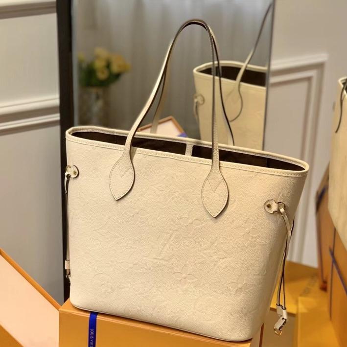 Neverfull MM 32 Cream Embossed Cowhide Leather