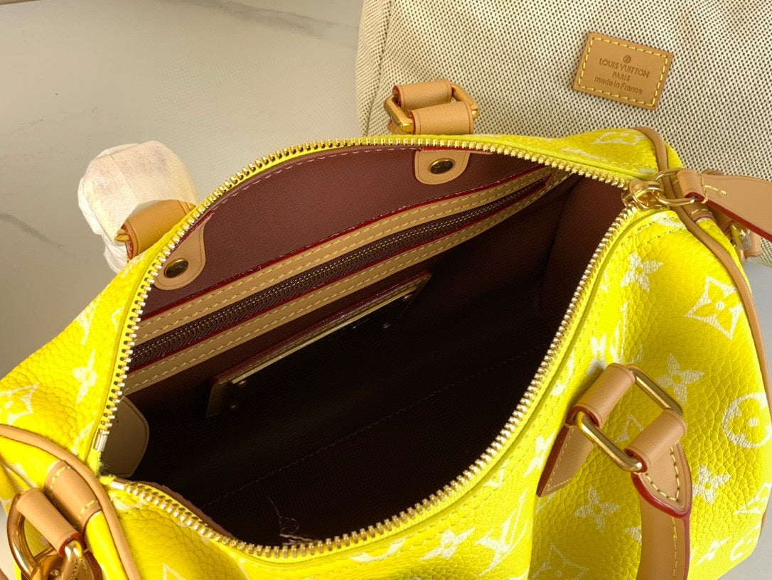 Speedy P9 Bandoulière 25 in Yellow Monogram Calfskin