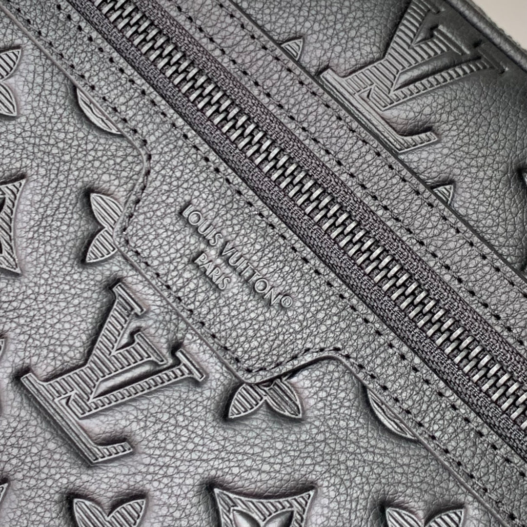 Pochette Kasai 24.5 in Black Monogram Shadow Calfskin