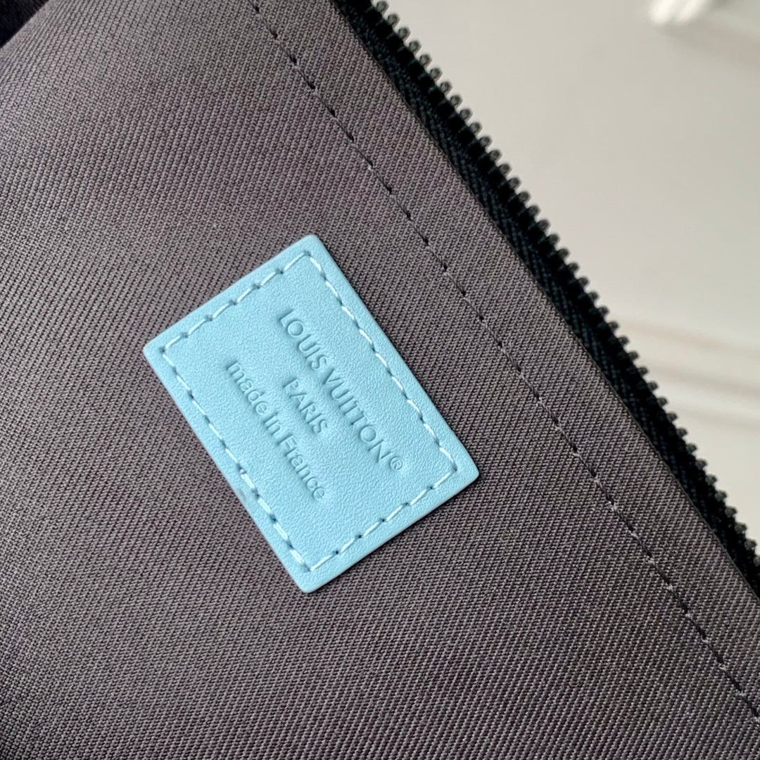 Pochette to Go 30 in Sky Blue Monogram Shadow Calfskin Embossed Logo