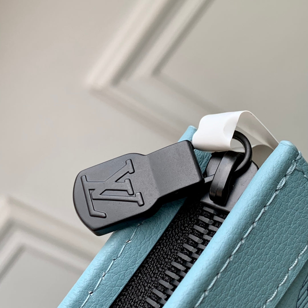 Pochette Voyage 26 in Sky Blue Monogram Eclipse Calfskin