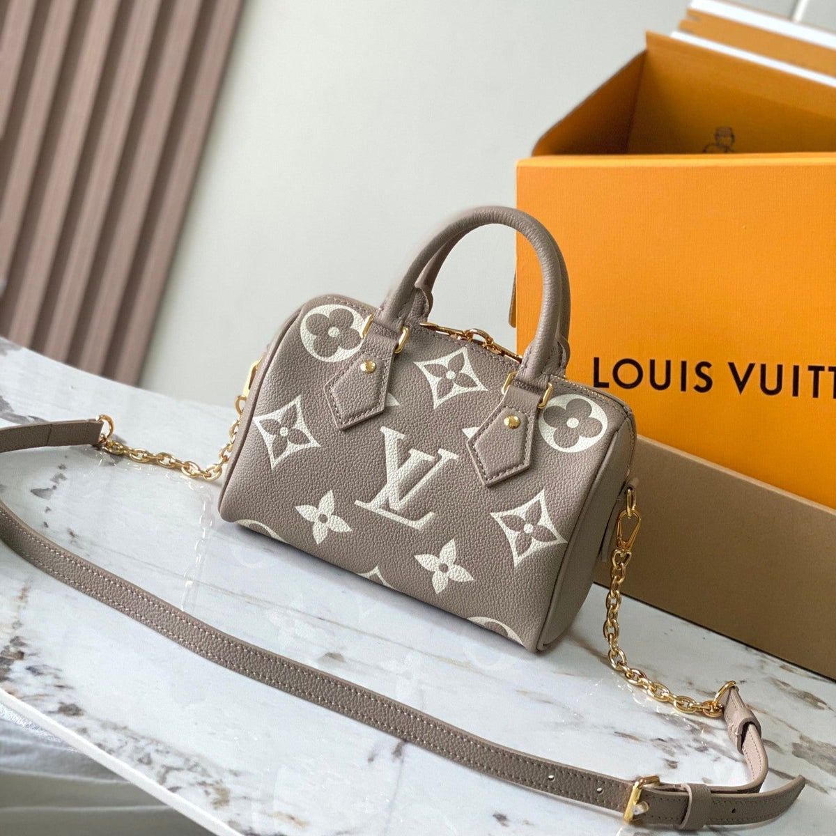 Speedy Bandoulière 20 in Taupe Brown and White Monogram Empreinte Leather