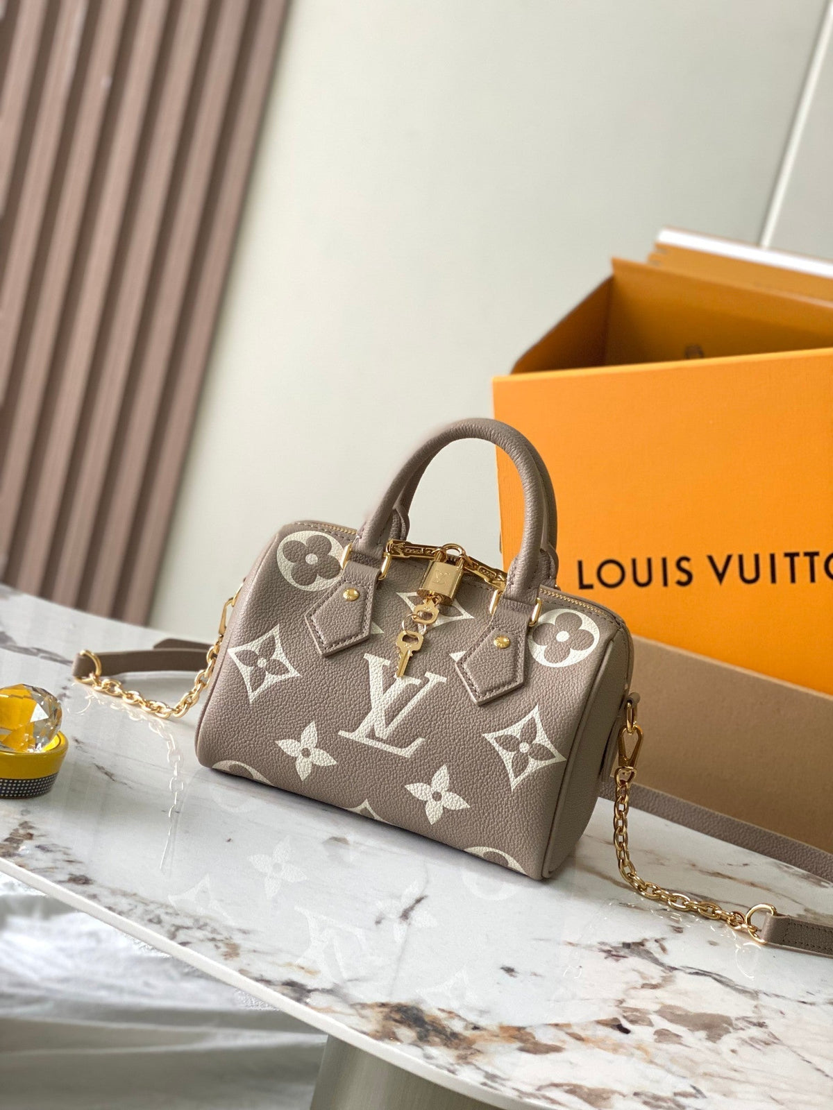 Speedy Bandoulière 20 in Taupe Brown and White Monogram Empreinte Leather