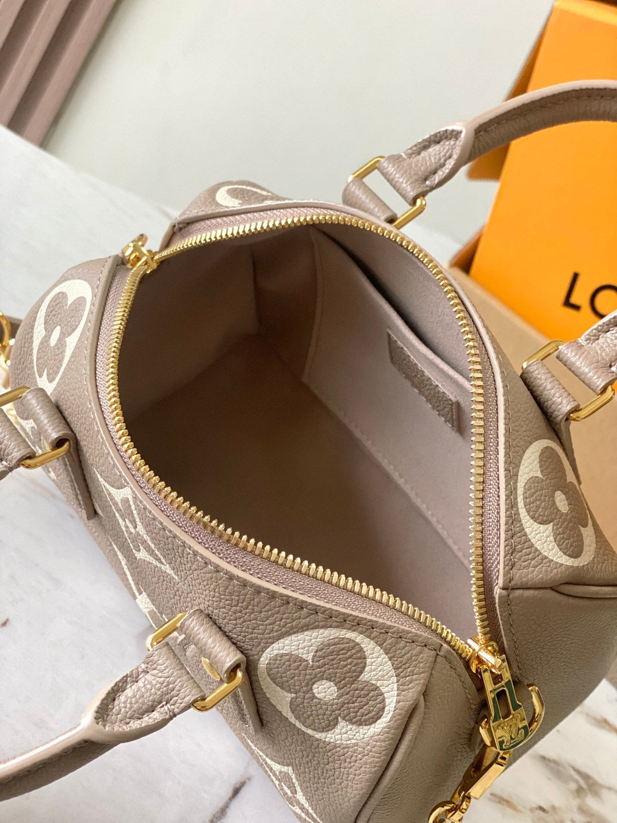 Speedy Bandoulière 20 in Taupe Brown and White Monogram Empreinte Leather