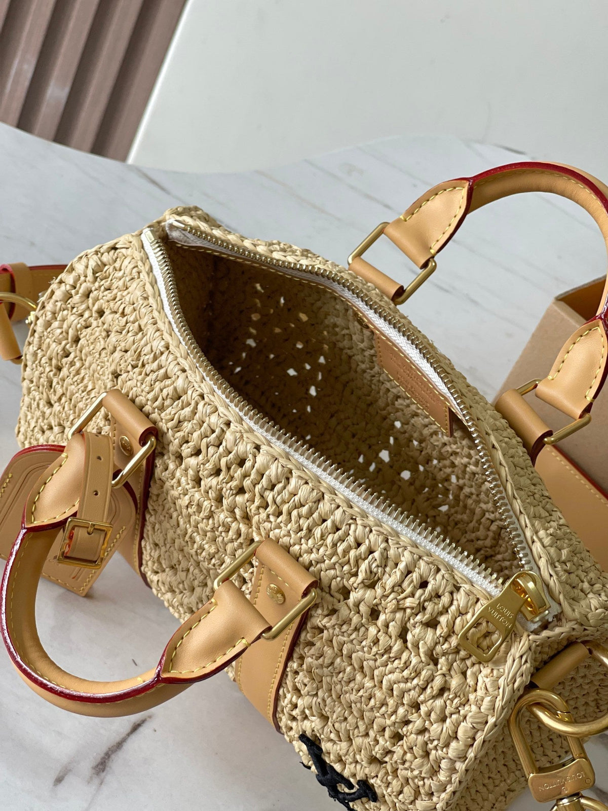 Keepall Bandoulière 25 in Beige Crocheted Raffia and Calfskin Trim