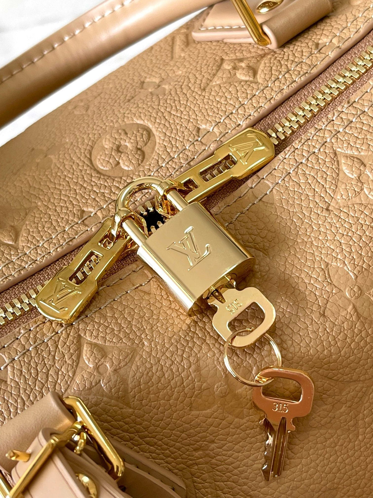 Speedy Soft 30 in Pale Orange Embossed Calfskin