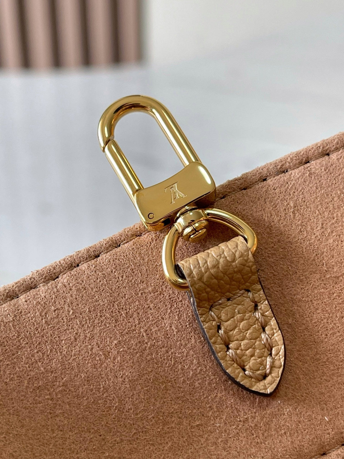 Onthego PM 25 in Milk Tea Monogram Impreinte Leather