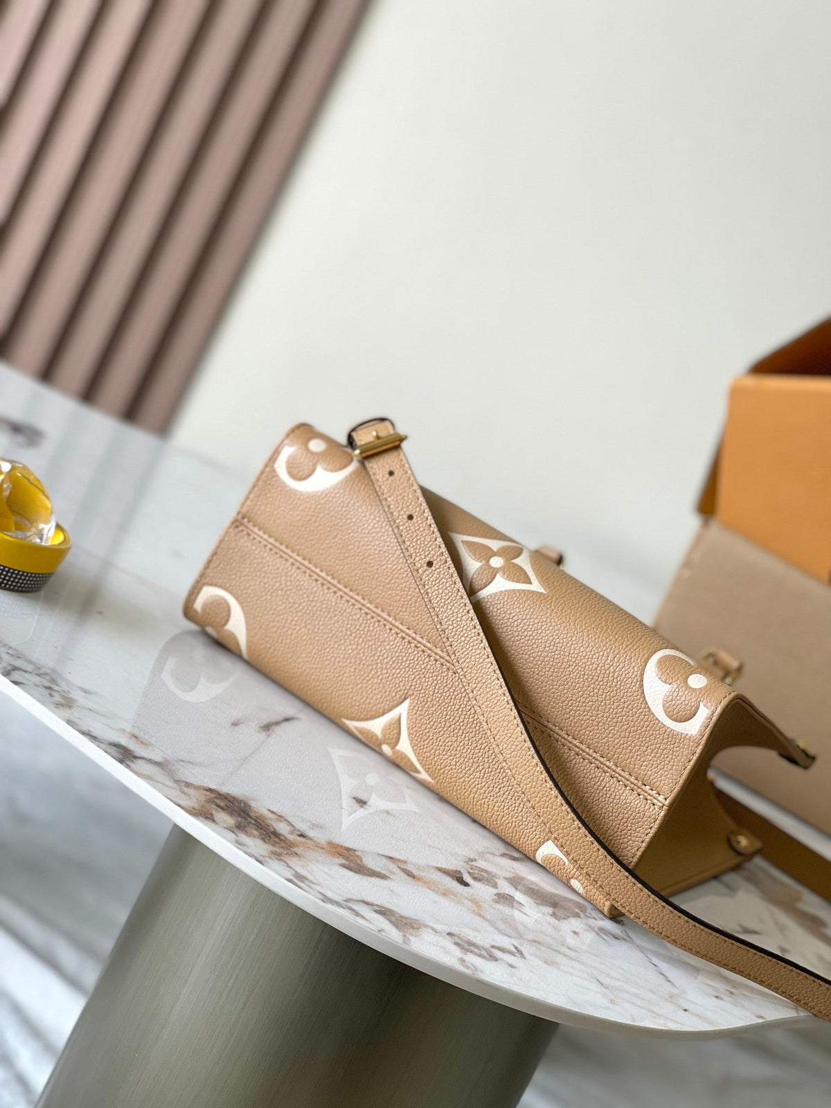 Onthego PM 25 in Milk Tea Monogram Impreinte Leather
