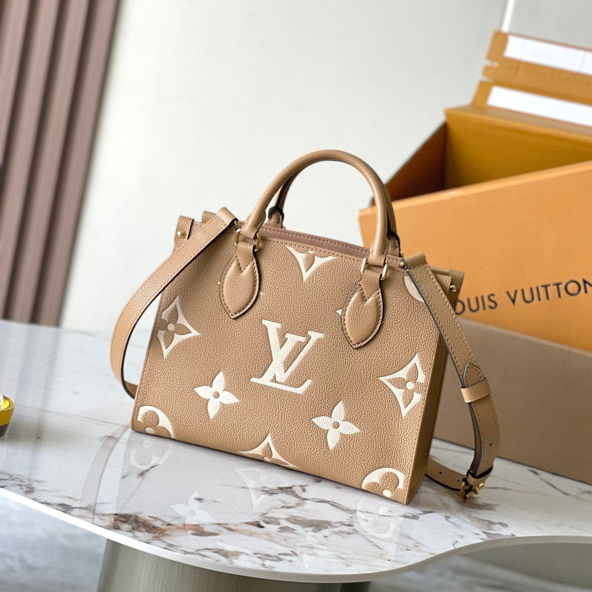 Onthego PM 25 in Milk Tea Monogram Impreinte Leather
