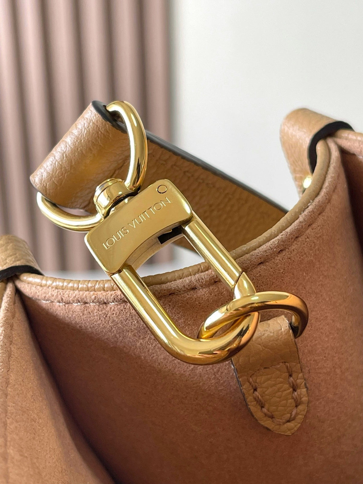 Onthego PM 25 in Milk Tea Monogram Impreinte Leather
