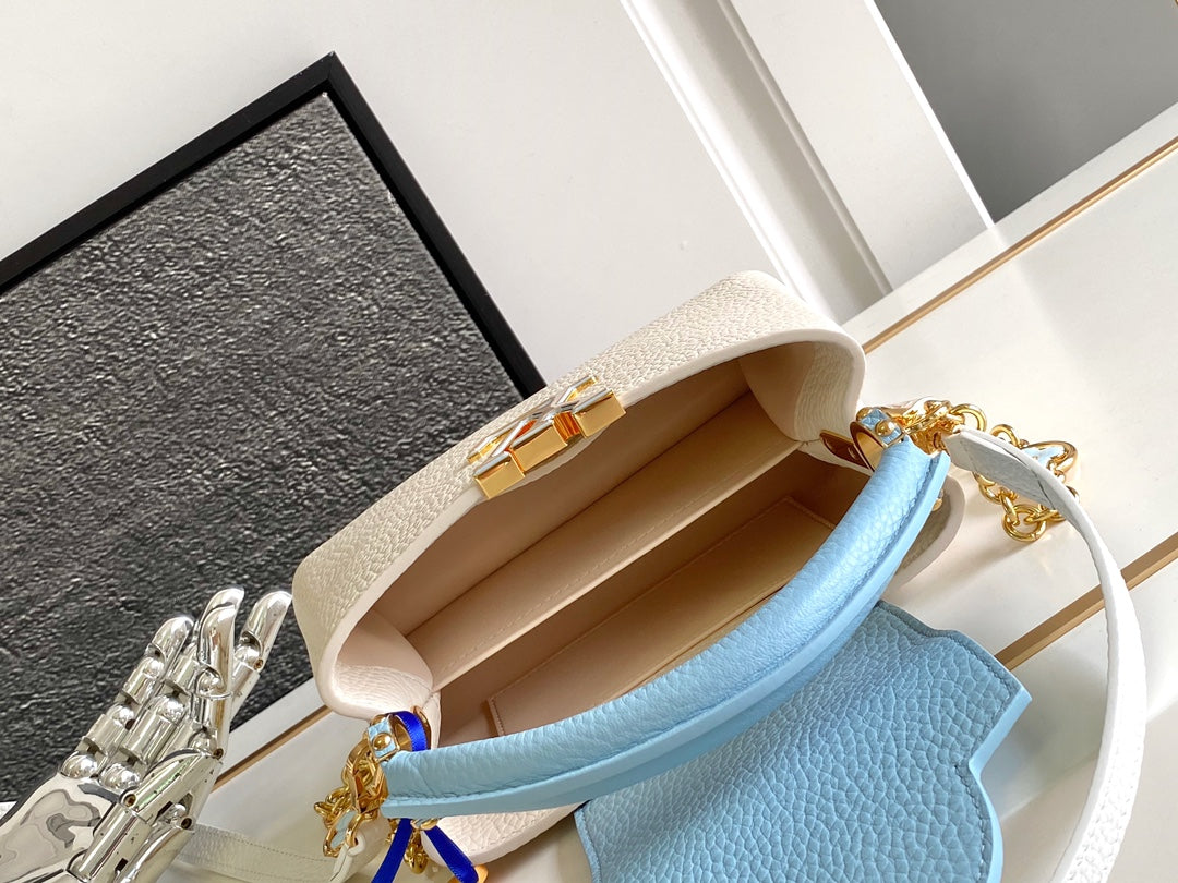 Capucines Mini 21 in Pearl White Mix Sky Blue Taurillon Gold Hardware