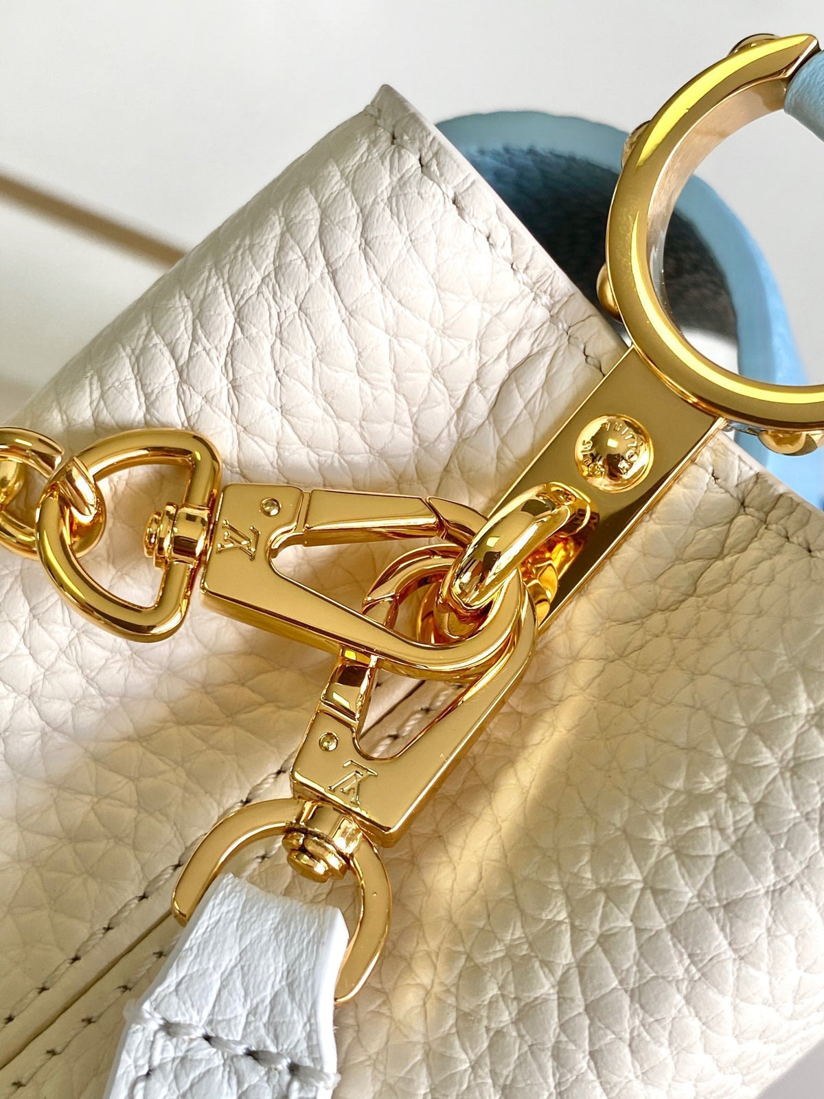 Capucines Mini 21 in Pearl White Mix Sky Blue Taurillon Gold Hardware