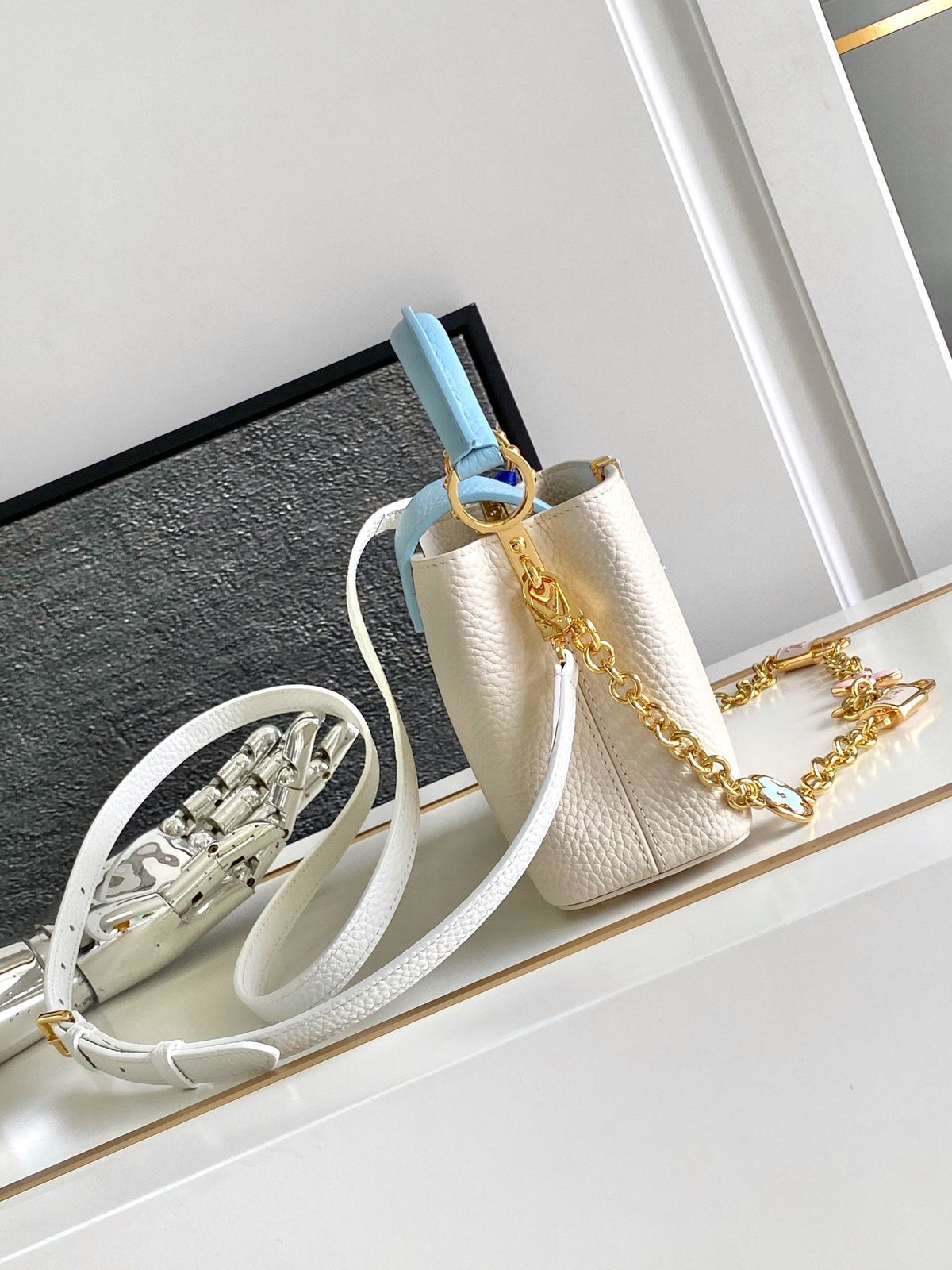 Capucines Mini 21 in Pearl White Mix Sky Blue Taurillon Gold Hardware