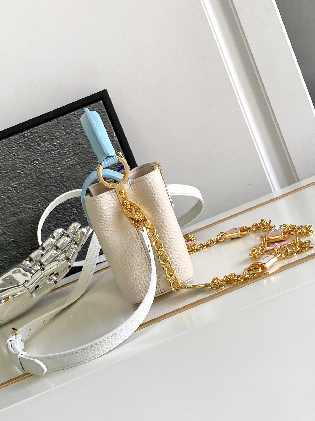 Capucines Nano 16 in Pearl White Mix Sky Blue Taurillon Gold Hardware