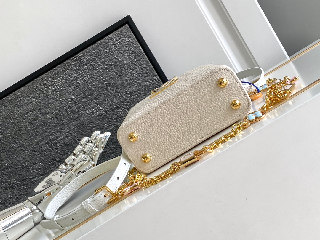 Capucines Nano 16 in Pearl White Mix Sky Blue Taurillon Gold Hardware