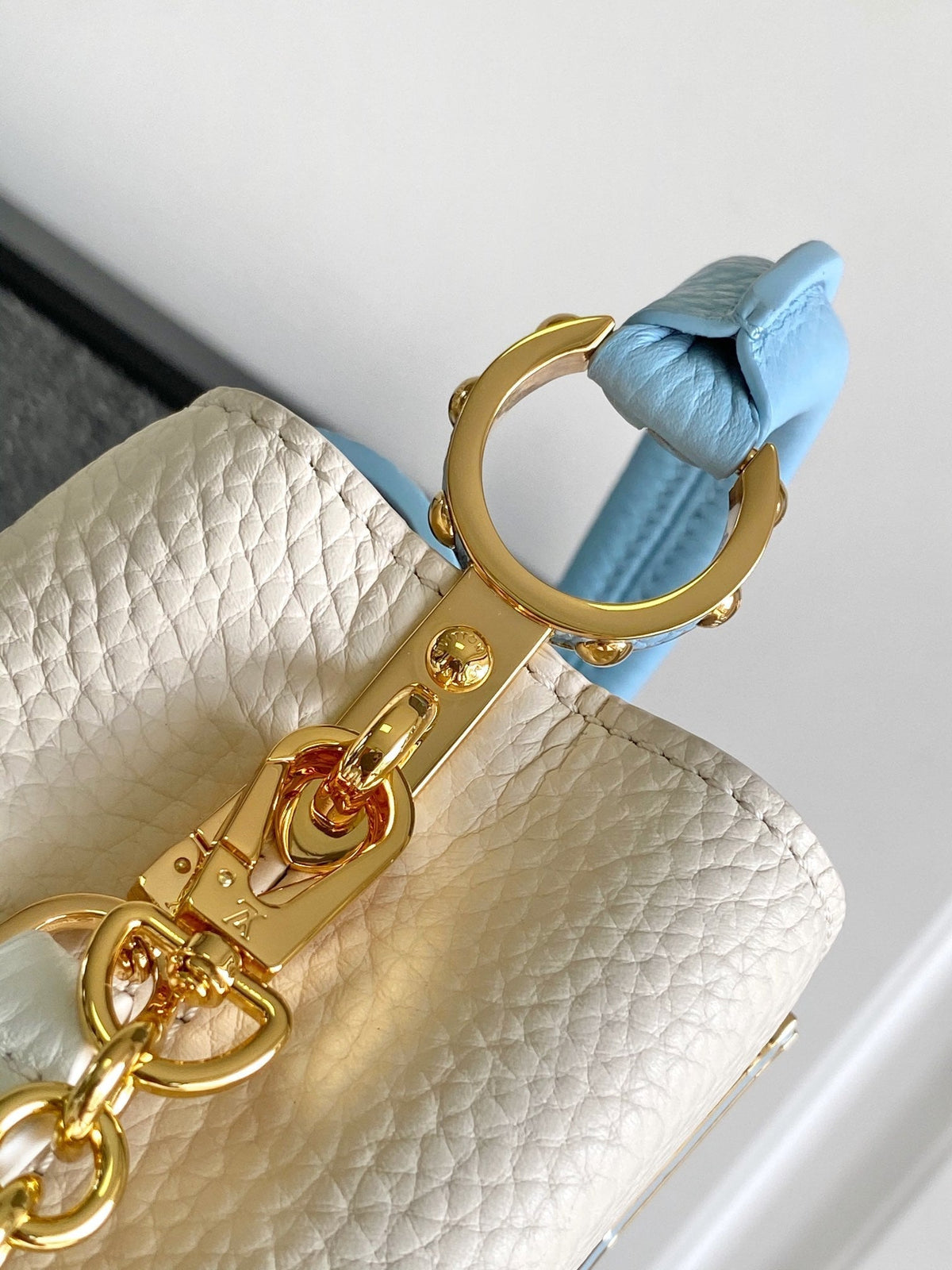 Capucines Nano 16 in Pearl White Mix Sky Blue Taurillon Gold Hardware