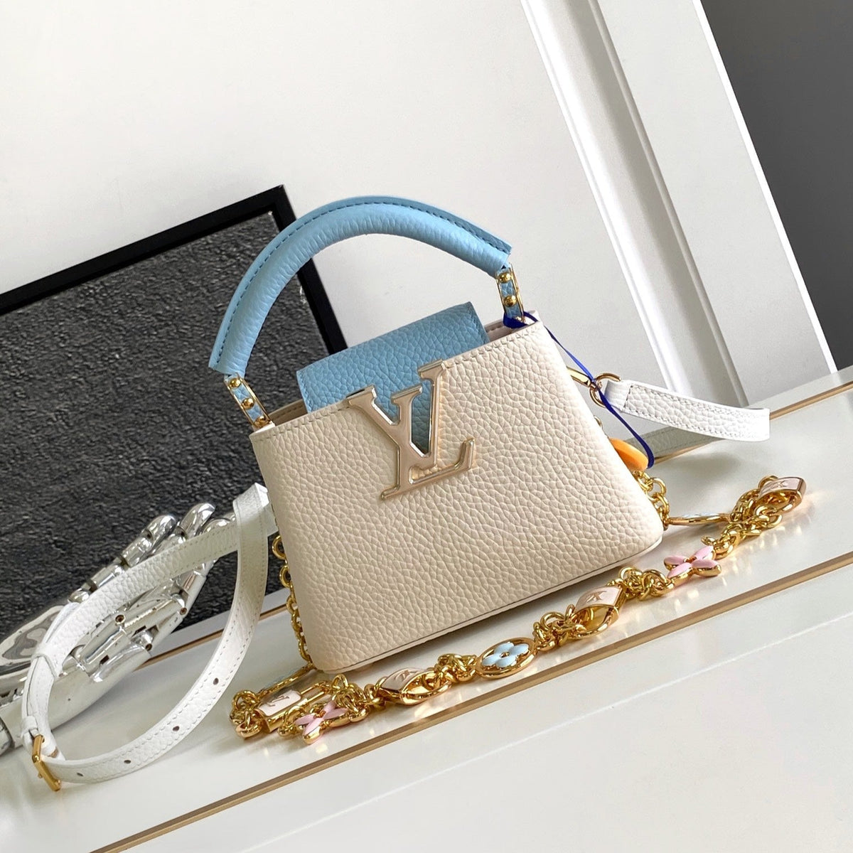 Capucines Nano 16 in Pearl White Mix Sky Blue Taurillon Gold Hardware