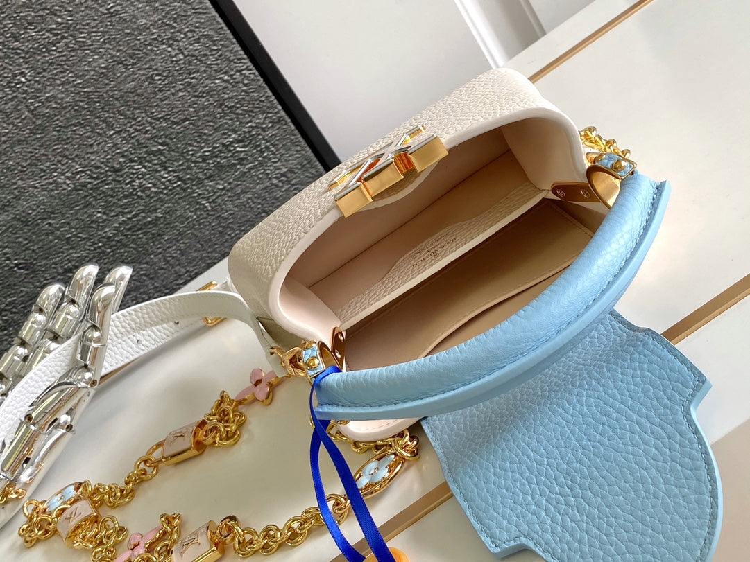 Capucines Nano 16 in Pearl White Mix Sky Blue Taurillon Gold Hardware