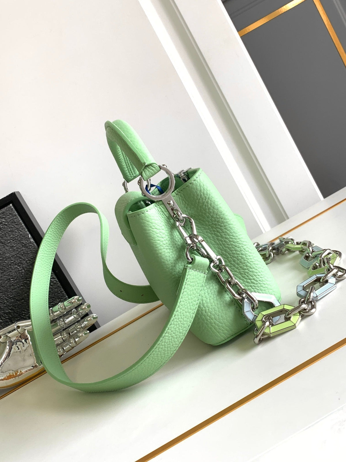 Capucines Mini 21 in Light Green Taurillon Silver Hardware
