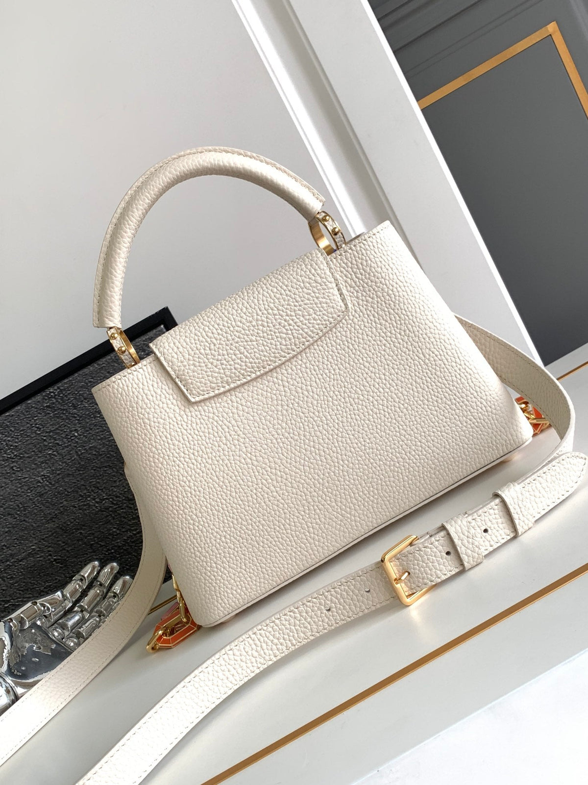 Capucines BB 27 in Pearl White Taurillon Gold Hardware