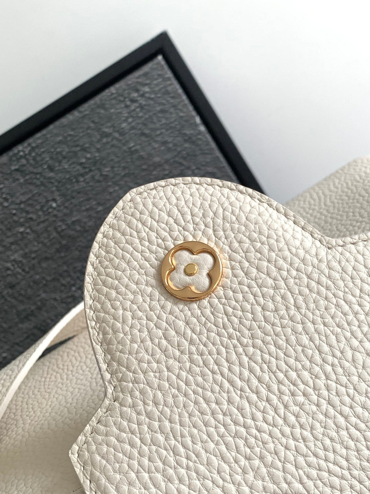 Capucines BB 27 in Pearl White Taurillon Gold Hardware