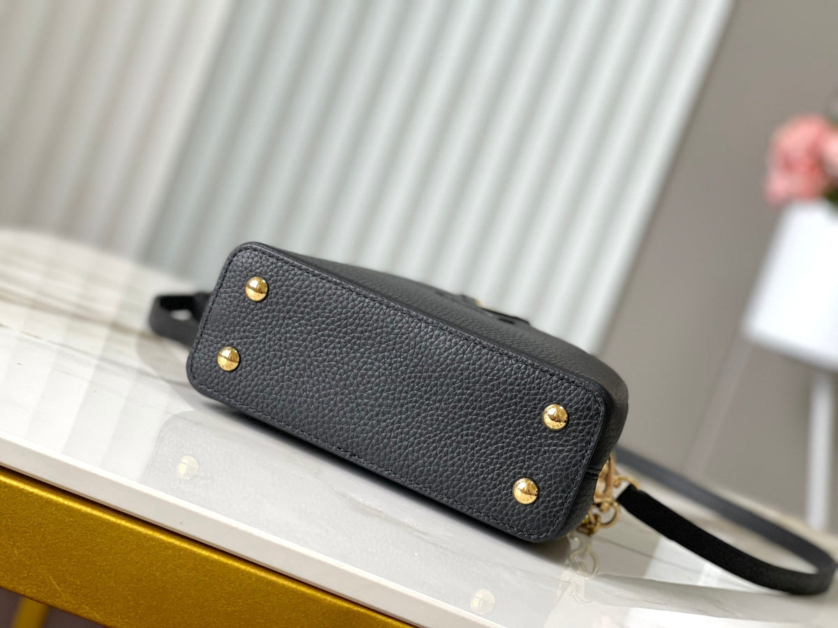 Capucines Mini 21 in Black Mix White Taurillon Gold Hardware