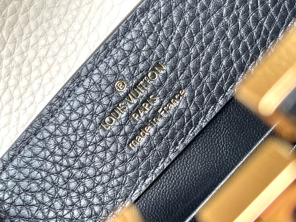 Capucines Mini 21 in Black Mix White Taurillon Gold Hardware
