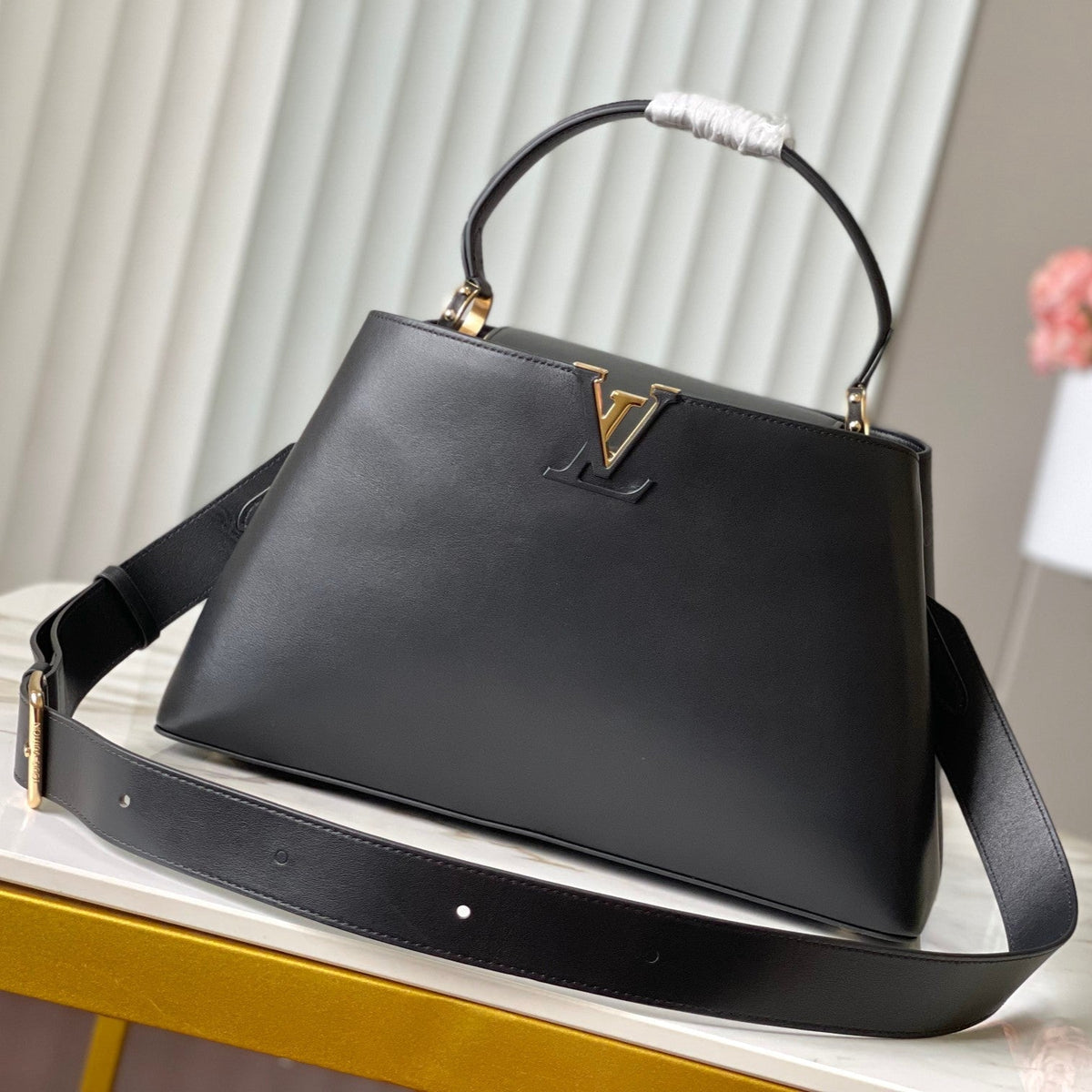 Capucines Souple GM 38 in Black Smooth Calfskin Gold Hardware