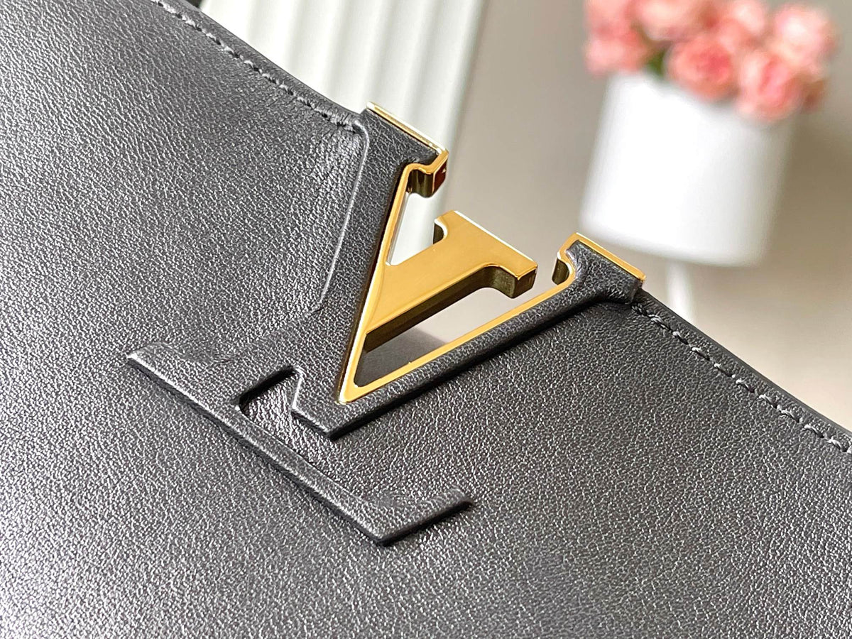 Capucines Souple GM 38 in Black Smooth Calfskin Gold Hardware