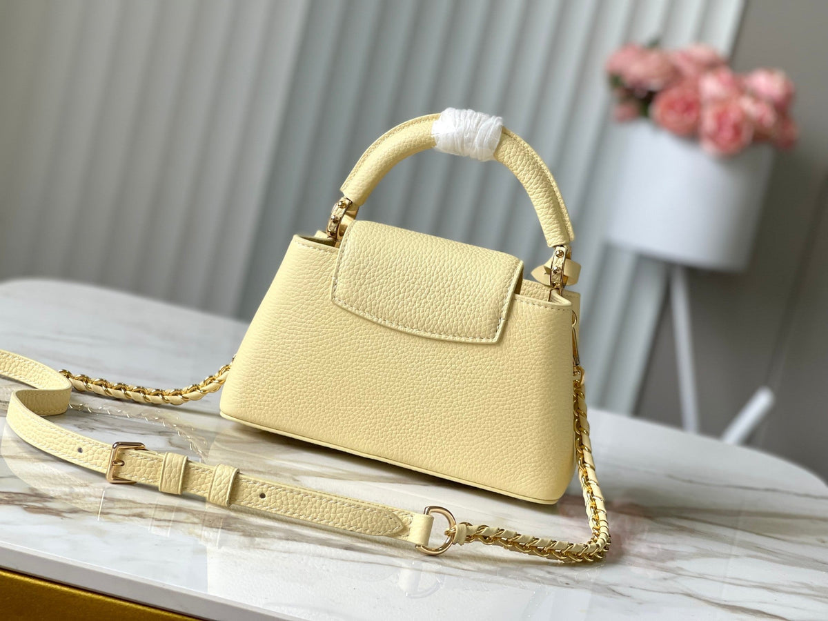 Capucines East-west Mini 22 in Banana Yellow Taurillon Gold Hardware