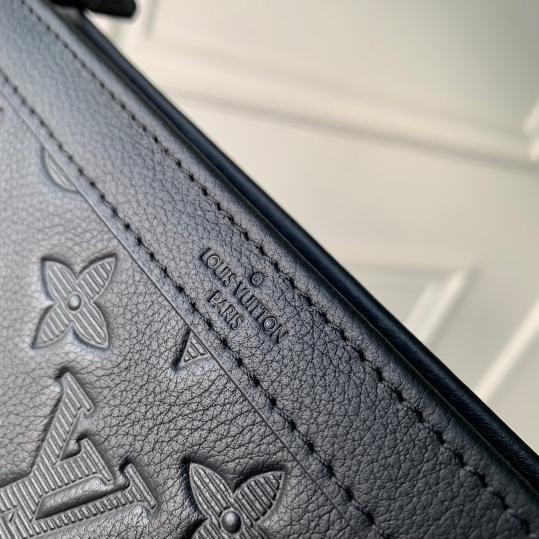 Pochette Voyage 22 in Black Monogram Shadow Calfskin