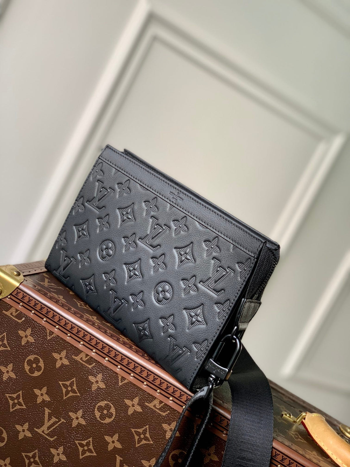 Pochette Voyage 22 in Black Monogram Shadow Calfskin