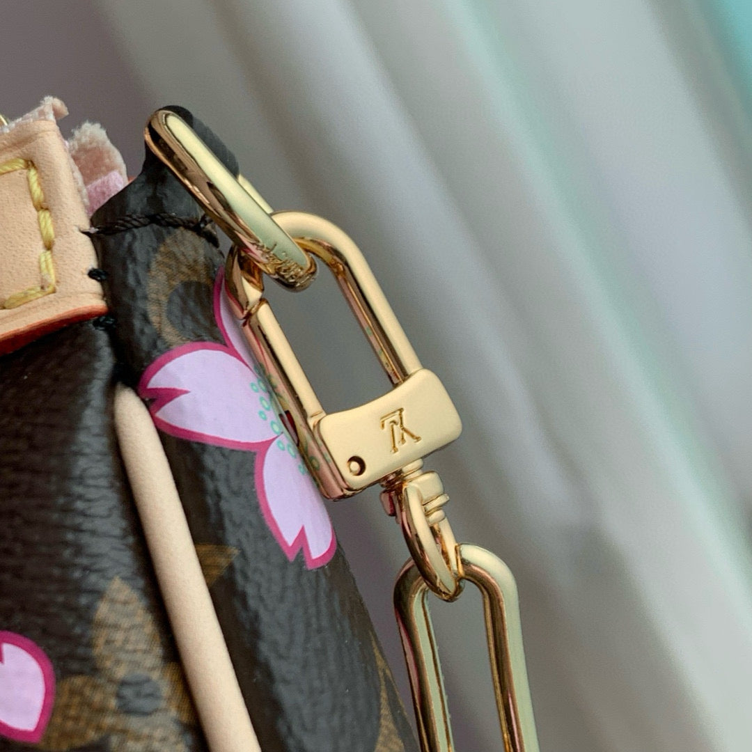 Pochette Accessoires 22 in Brown Monogram Canvas Cherry Blossom