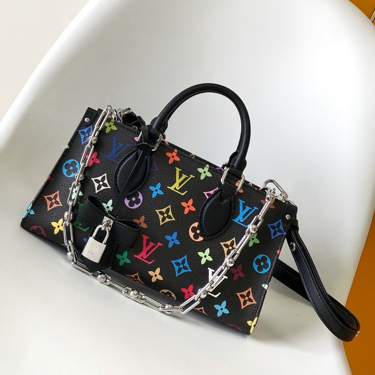Onthego East West Bag 25 in Colorful Monogram Pattern Canvas