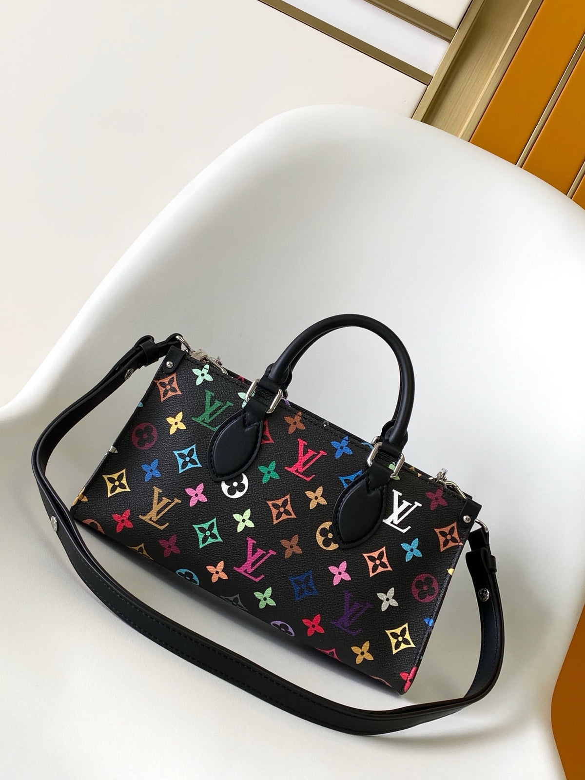 Onthego East West Bag 25 in Colorful Monogram Pattern Canvas