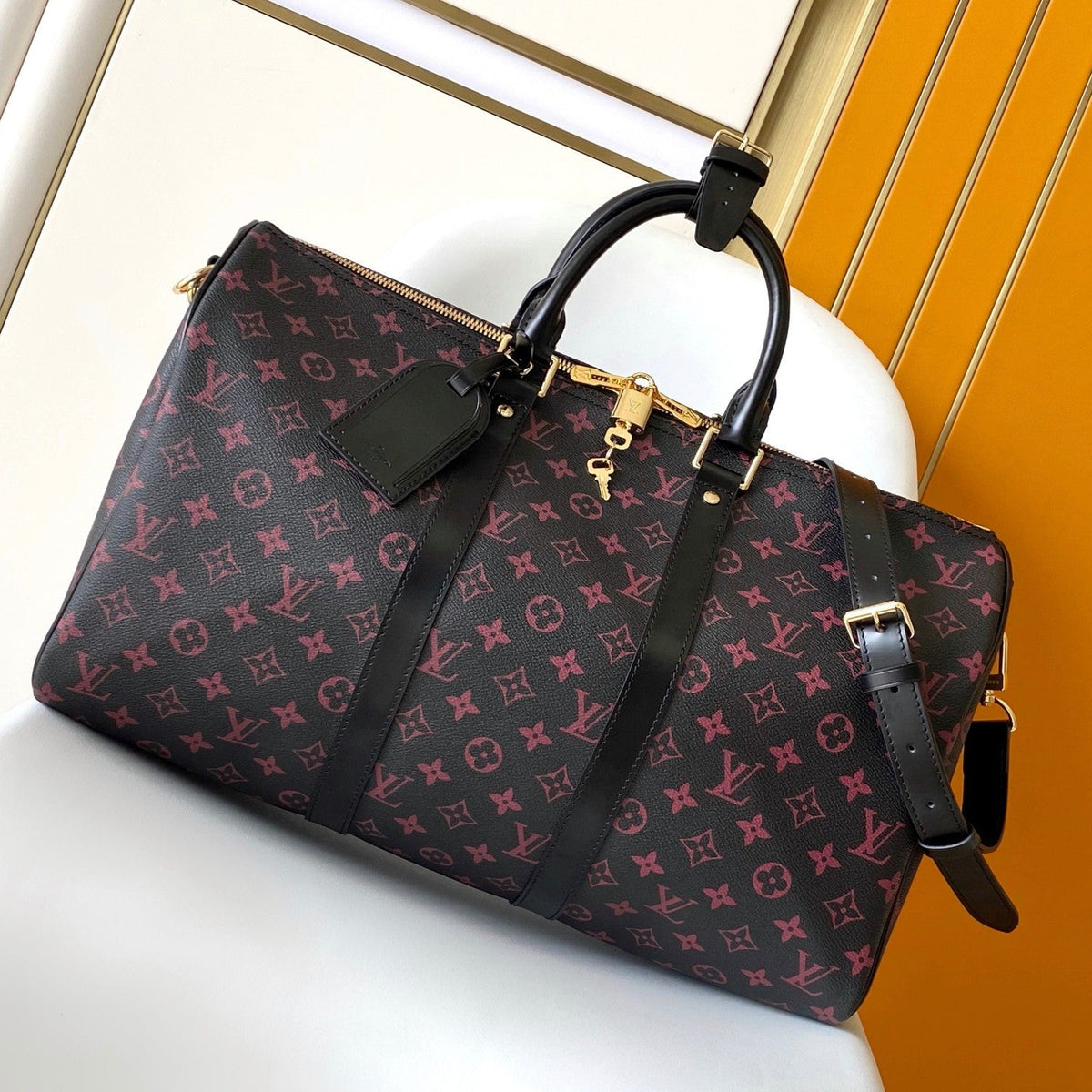 Keepall Bandoulière 45 in Black Monogram Tomette Canvas