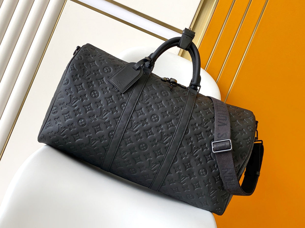 25S Keepall Bandoulière Bag 50 in Black Embossed Taurillon Calfskin Monogram