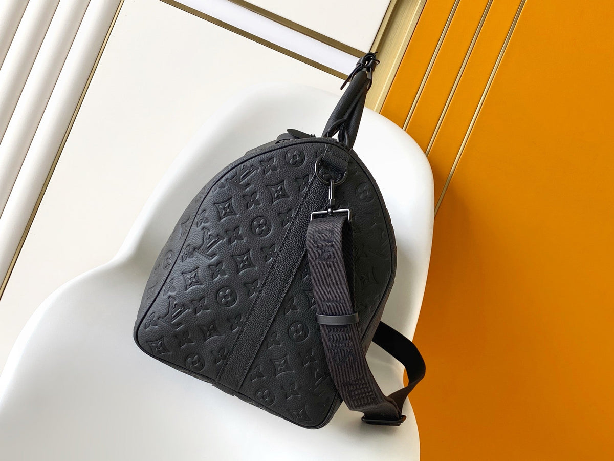 25S Keepall Bandoulière Bag 50 in Black Embossed Taurillon Calfskin Monogram