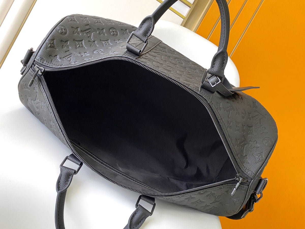 25S Keepall Bandoulière Bag 50 in Black Embossed Taurillon Calfskin Monogram