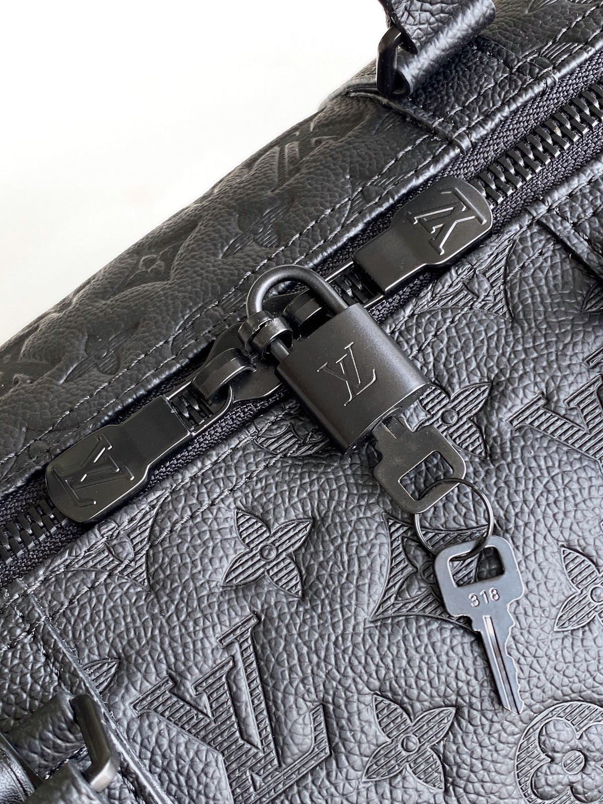 25S Keepall Bandoulière Bag 50 in Black Embossed Taurillon Calfskin Monogram
