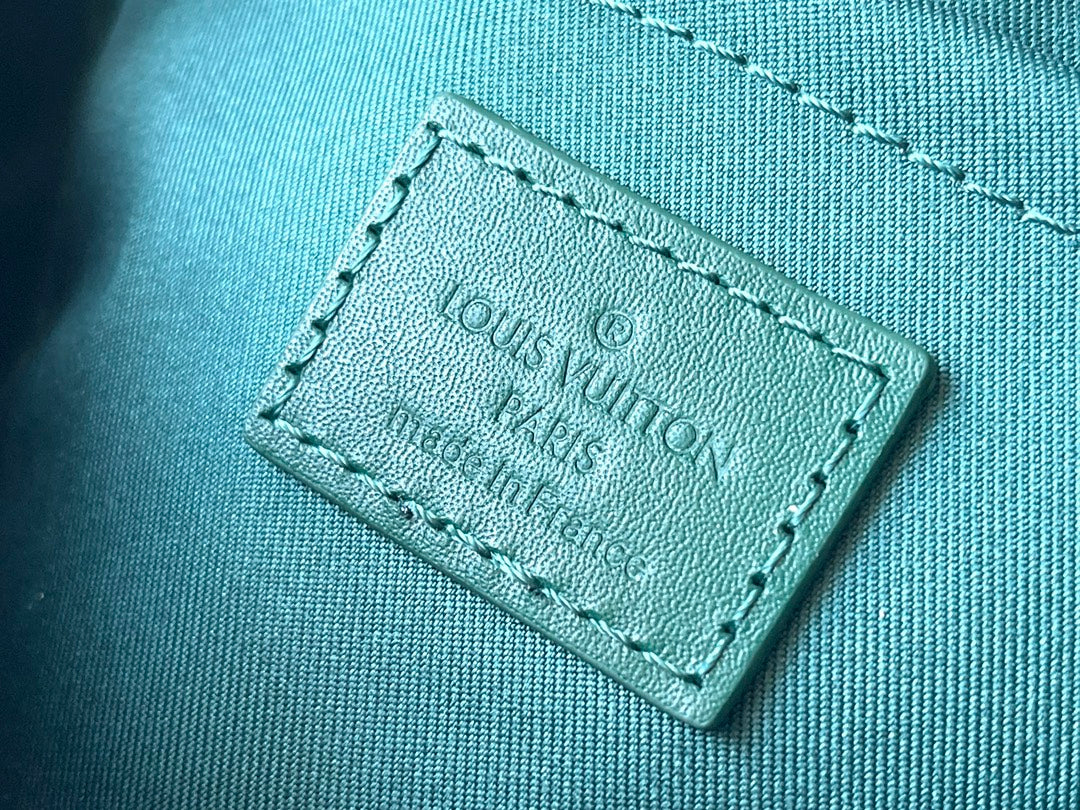 Keepall Bandoulière 25 in Green Monogram Heritage Canvas